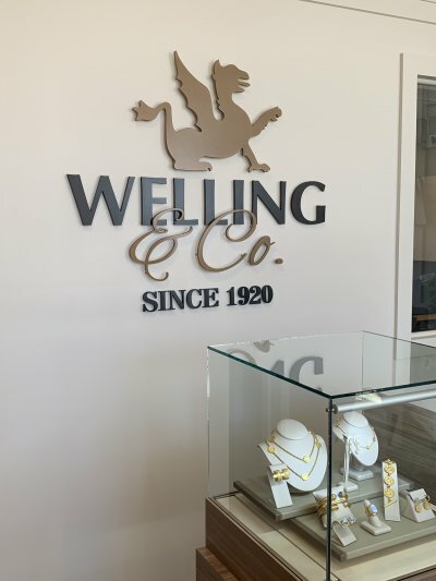 Welling & Co. Since 1920 logo on wall