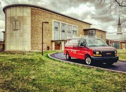 van outside of building